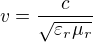 $v=\frac{c}{\sqrt{\varepsilon_r\mu_r}}$